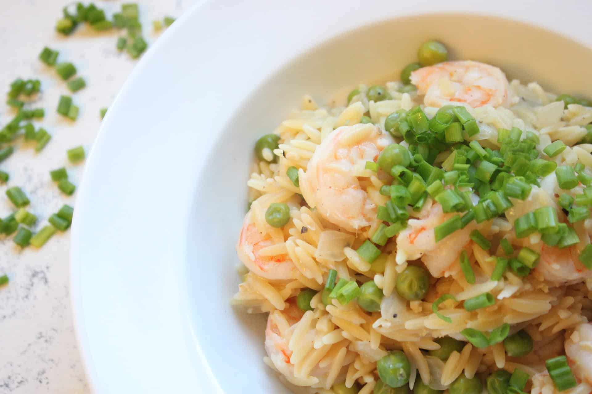 30 Minute Creamy Shrimp and Lemon Orzo in a White Bowl