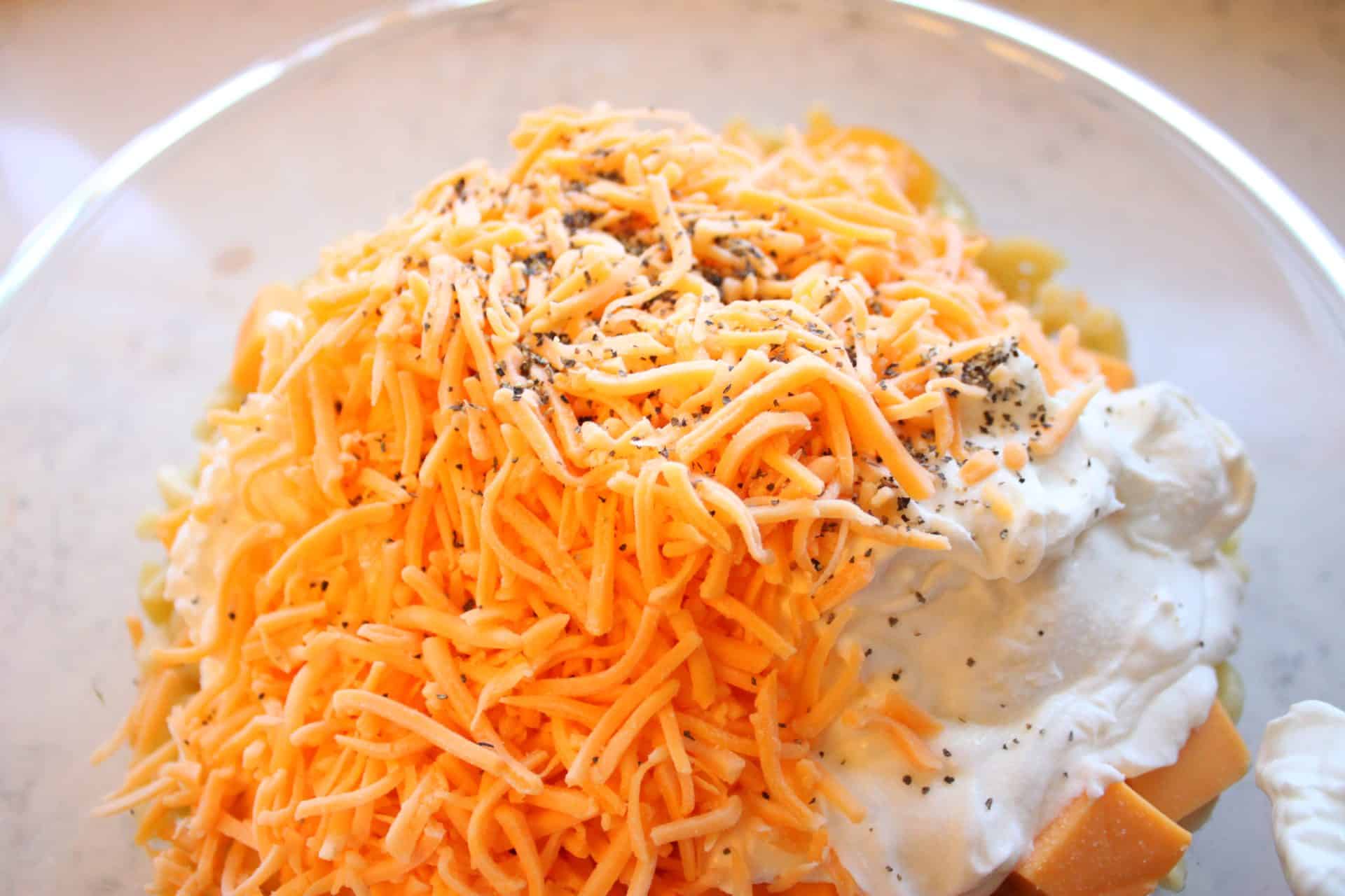 Adding Shredded Cheese to Macaroni Noodles