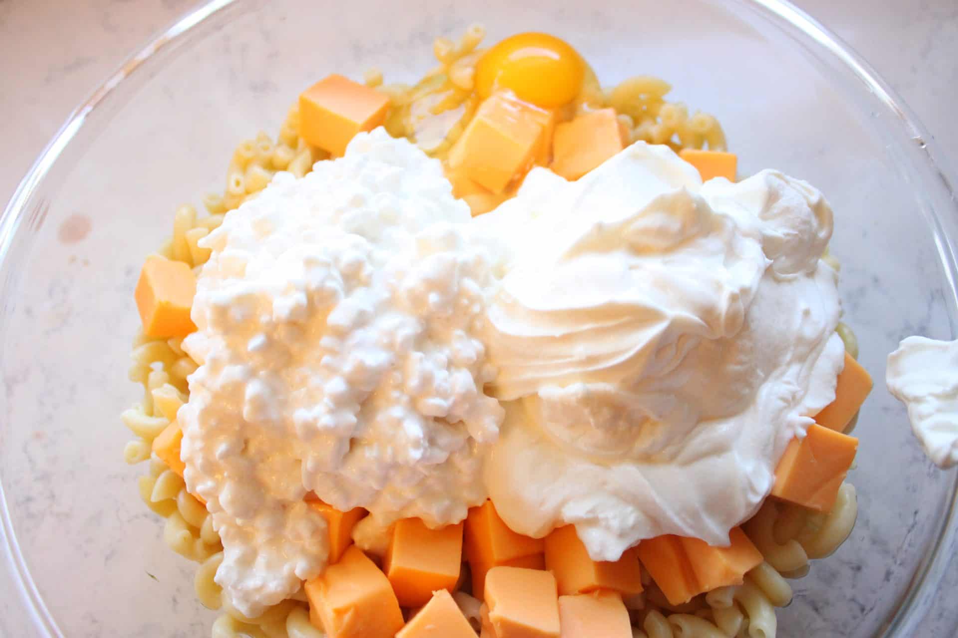 Adding Sour Cream and Cottage Cheese to Macaroni Noodles