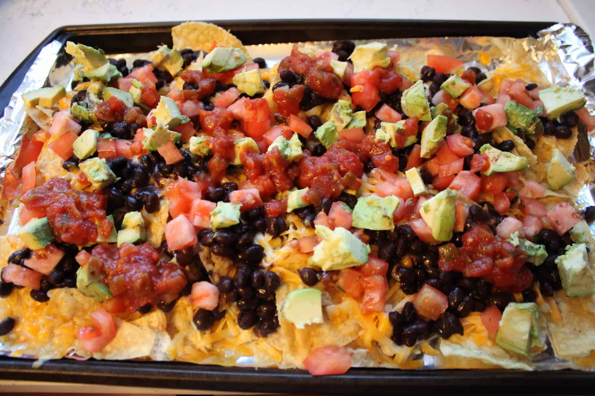 8 Ingredient Delicious Black Bean Nachos 2 Black Bean Nachos with all of the Ingredients Added