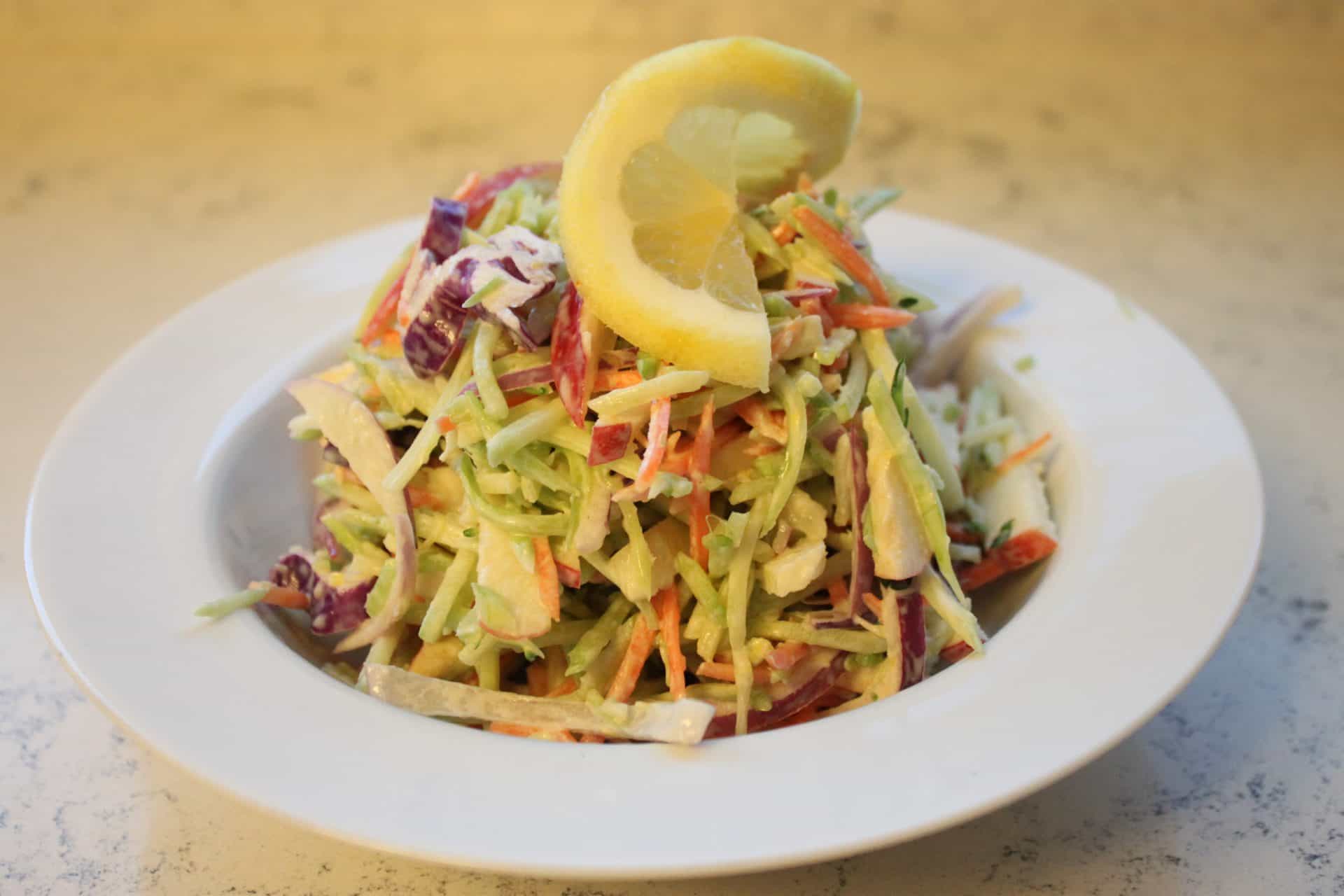 Bowl of Apple Broccoli and Horseradish Slaw