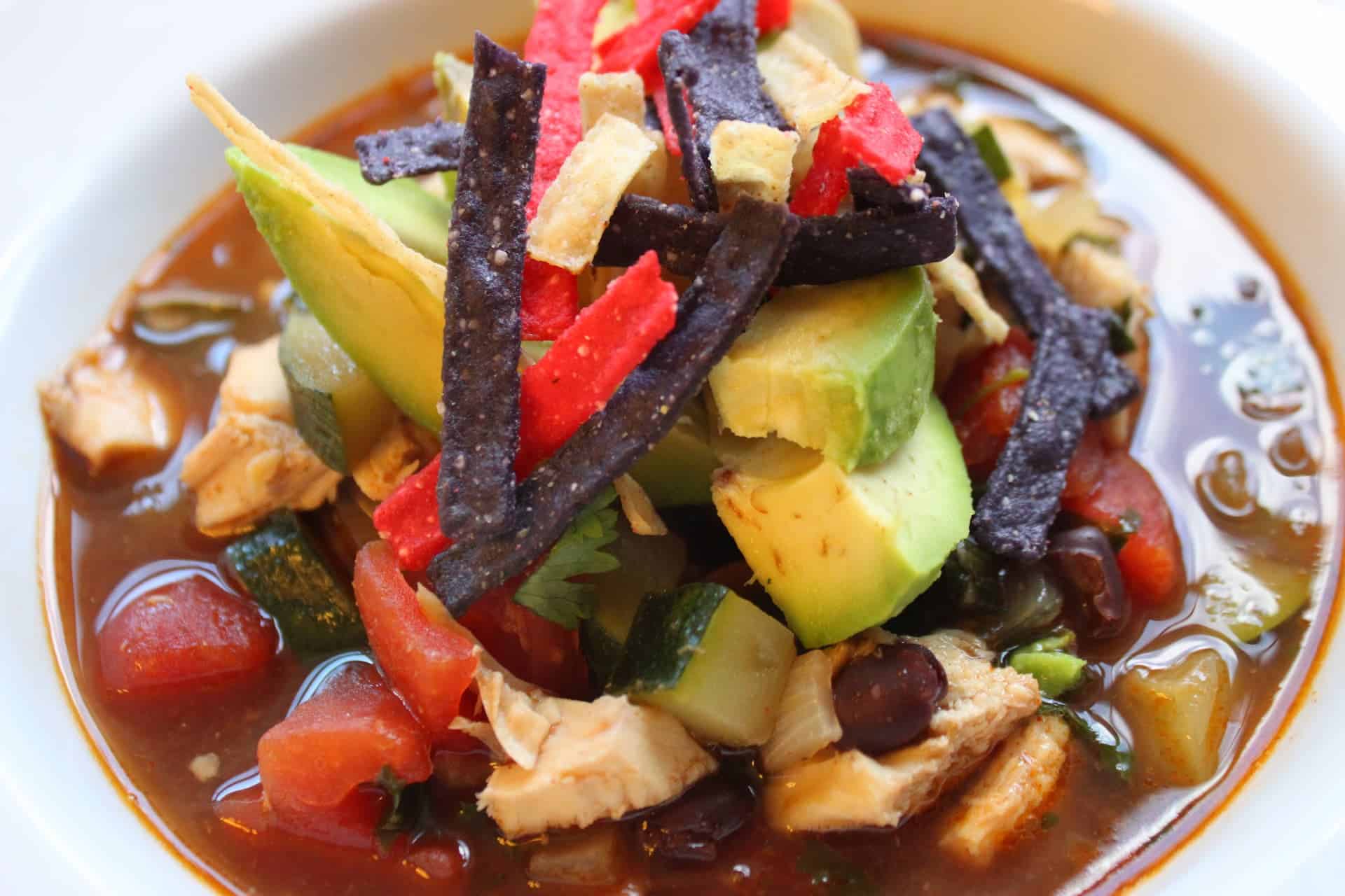 Close up of Chicken Tortilla Soup in a White Bowl