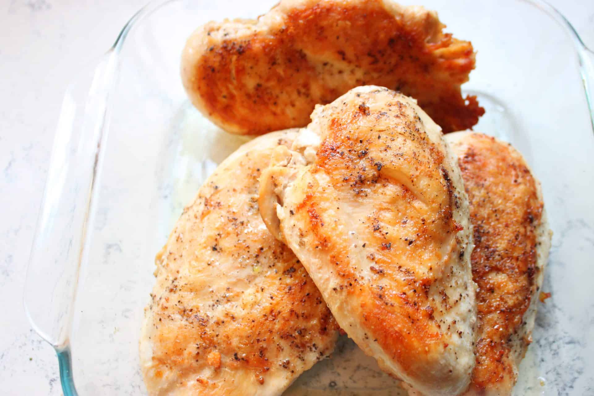 Delicious 30-Minute Chicken and Broccoli Casserole for Busy Nights 1 Golden-brown seasoned chicken breasts cooked and ready to be chopped for the 30 minute chicken and broccoli casserole recipe.