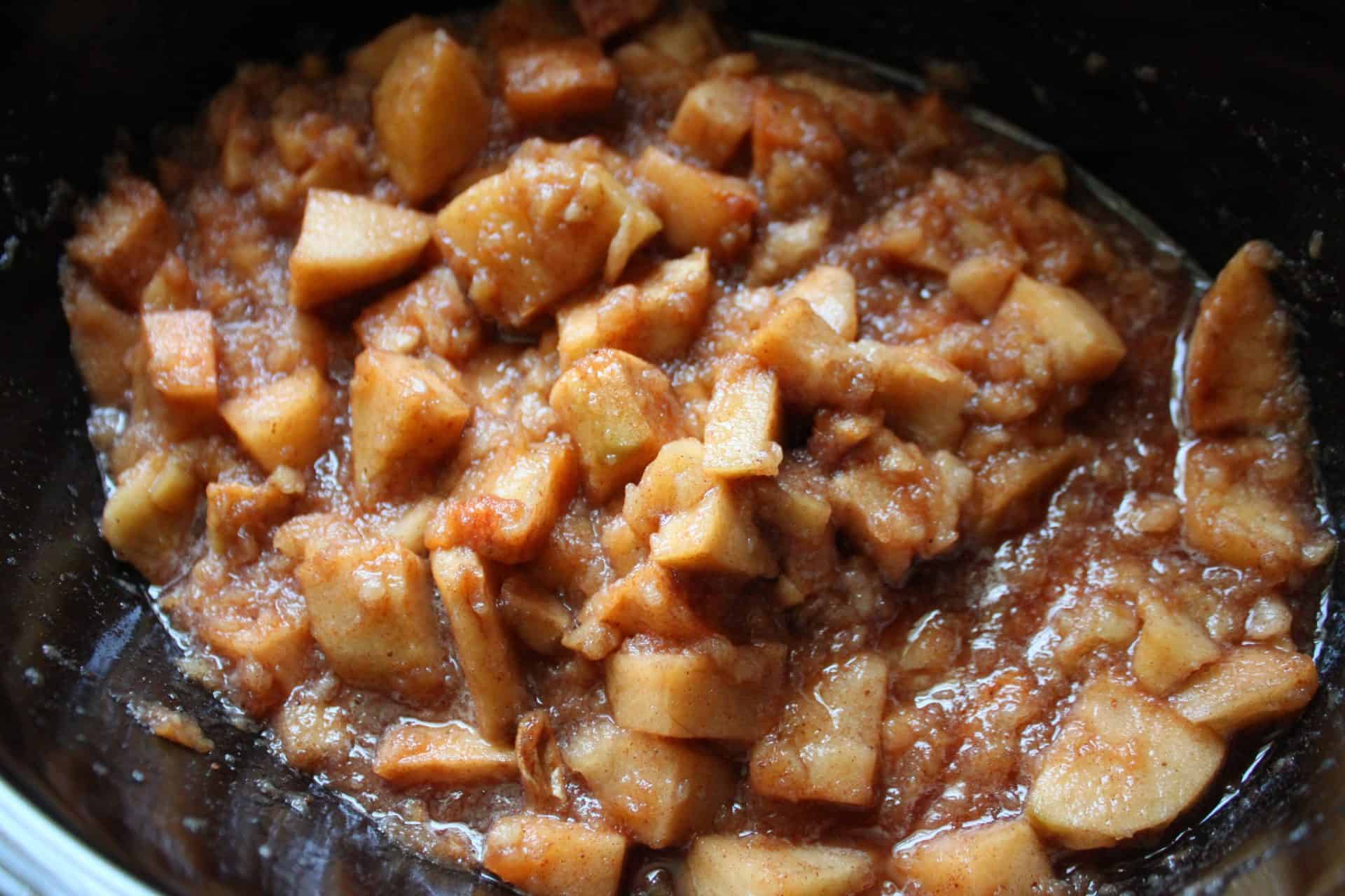 Cozy Up with This Simple Crockpot Cinnamon Applesauce Recipe 6 Crockpot Full of Cooked Cinnamon Apples