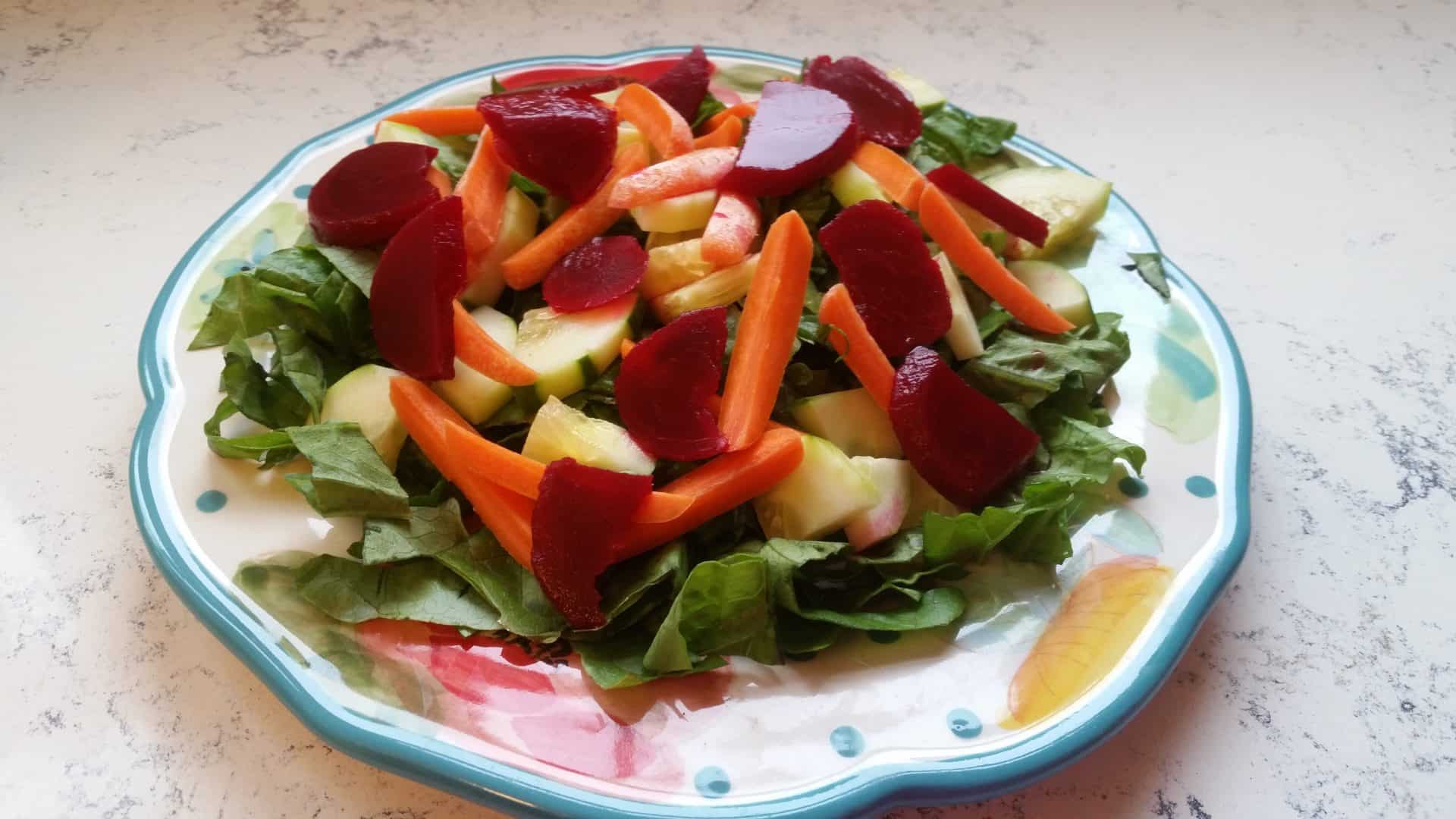 5-Minute Cottage Cheese and Beet Salad for a Delicious Lunch Fix 1 Cottage Cheese and Beet Salad Leafy Greens on a Plate