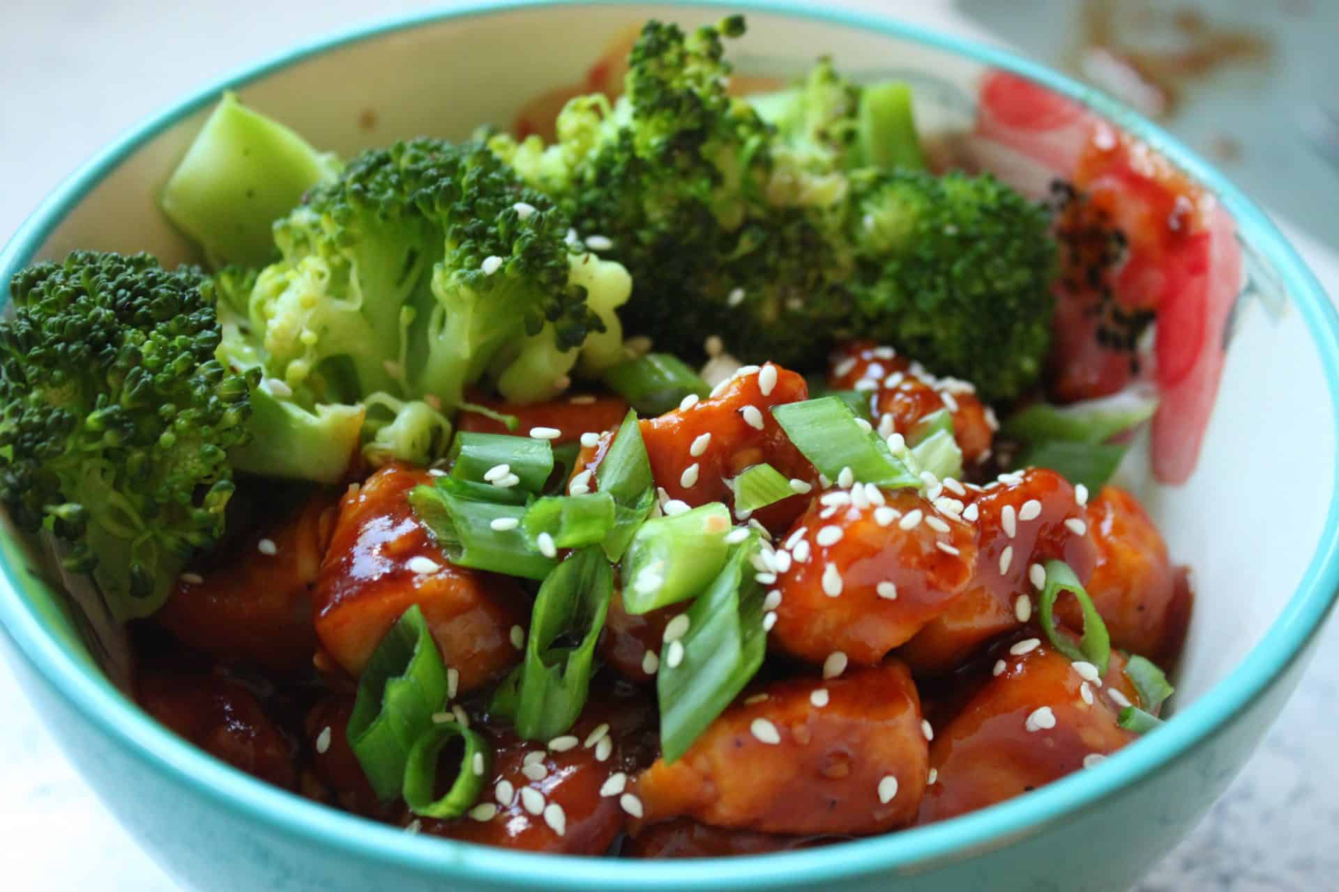 5 Ingredient Crockpot Orange Chicken 9 Crockpot Orange Chicken With Vegetables in a Blue Bowl