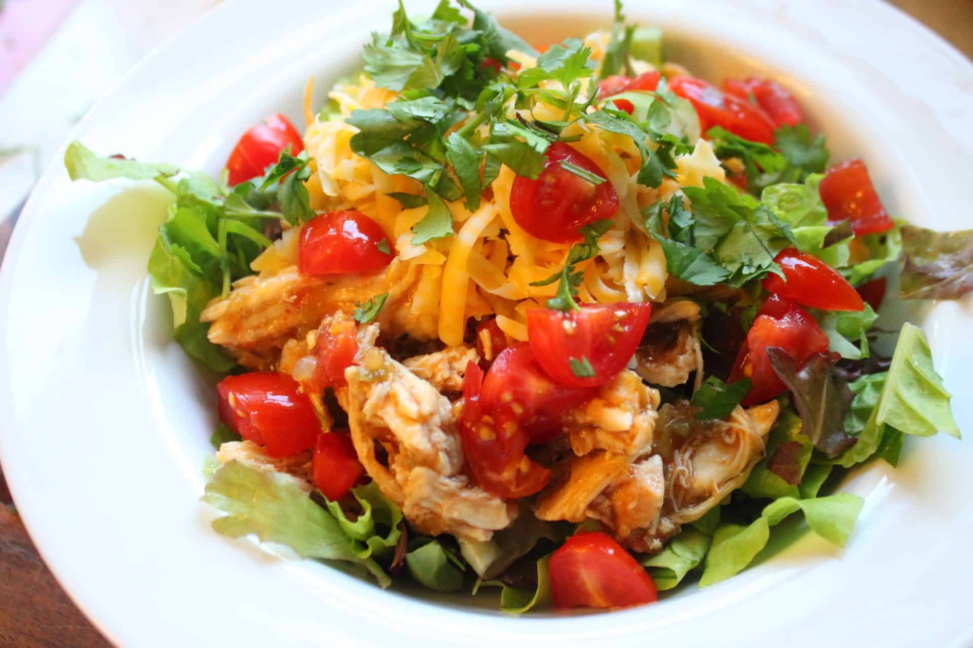 Crockpot Salsa Verde Chicken Salad in a White Bowl