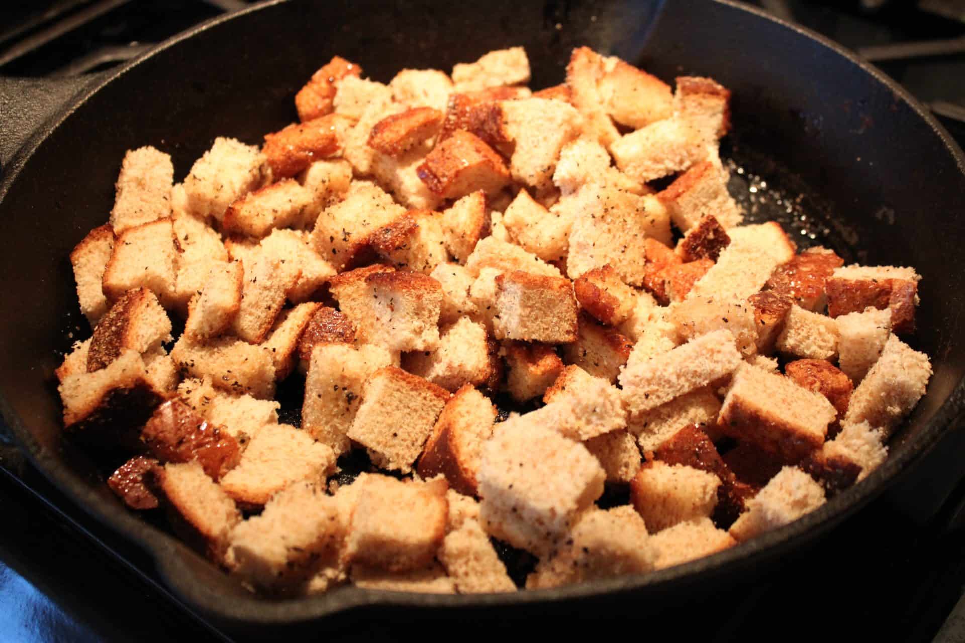 Irresistible Homemade Parmesan Croutons Your Family Will Devour 5 Crouton Squares in Cast Iron Skillet