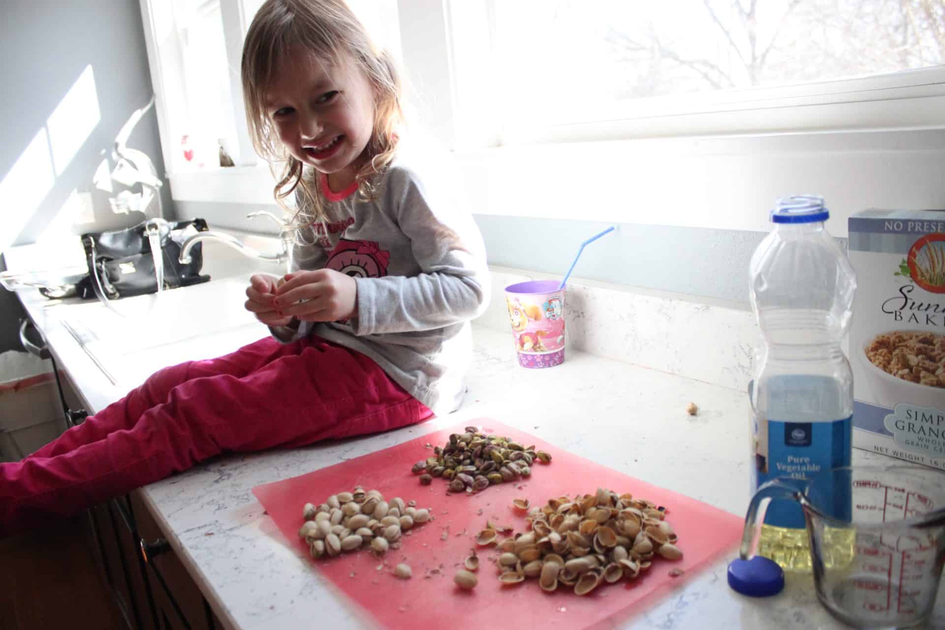 Daughter De-Shell the Pistachios