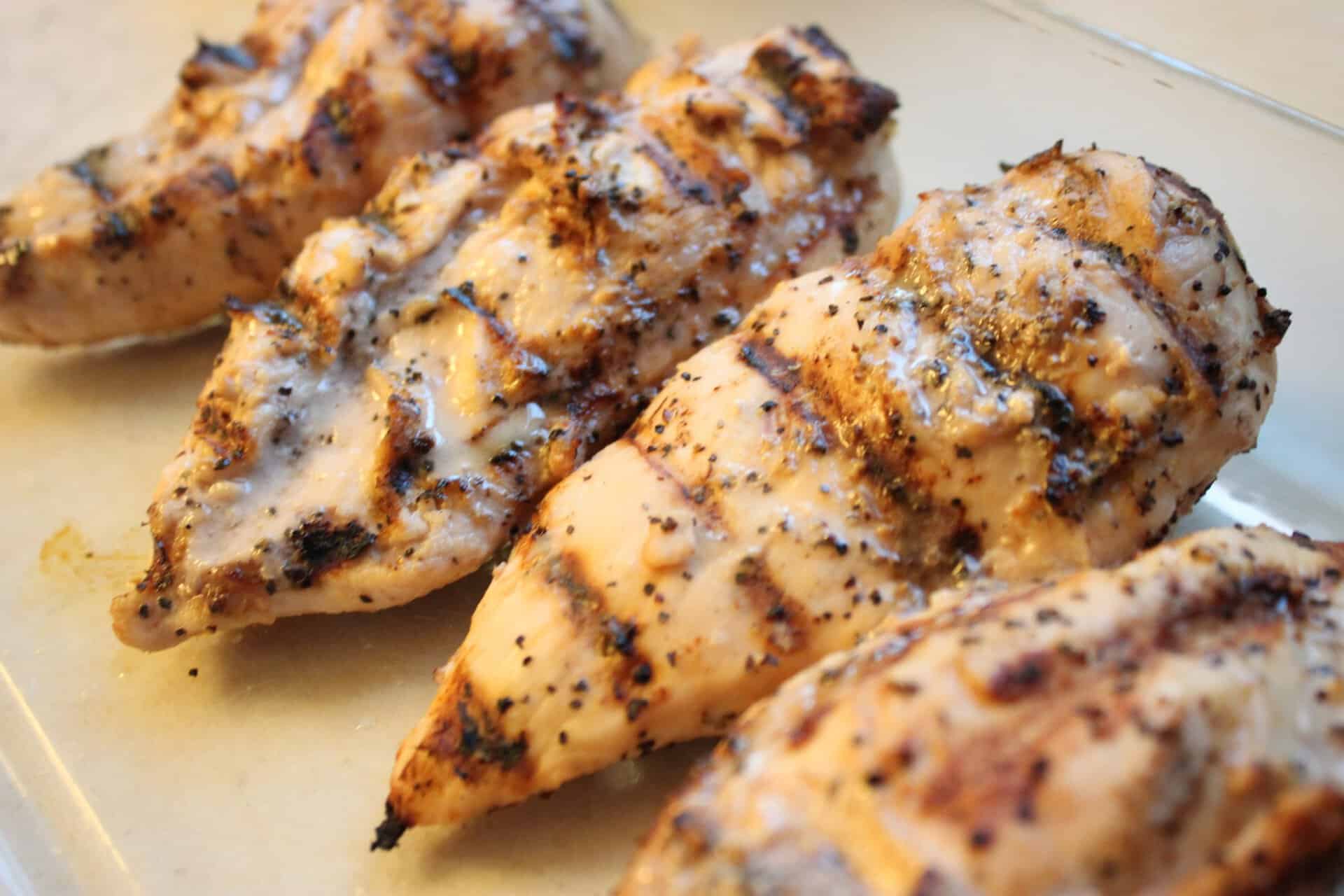 Simple & Tasty: How to Make 3 Ingredient Tangy Marinated Chicken 6 Grilled Tangy Marinated Chicken in a Clear Glass Dish