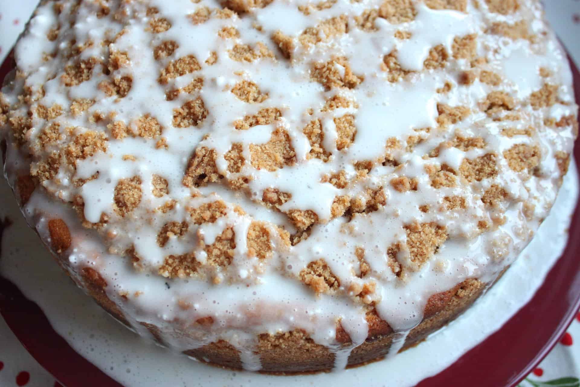 Eggnog Coffee Cake: A Perfect Christmas Morning Treat 12 Close-up of eggnog coffee cake with a cinnamon crumble and glaze, showing its deliciously spiced, moist texture.