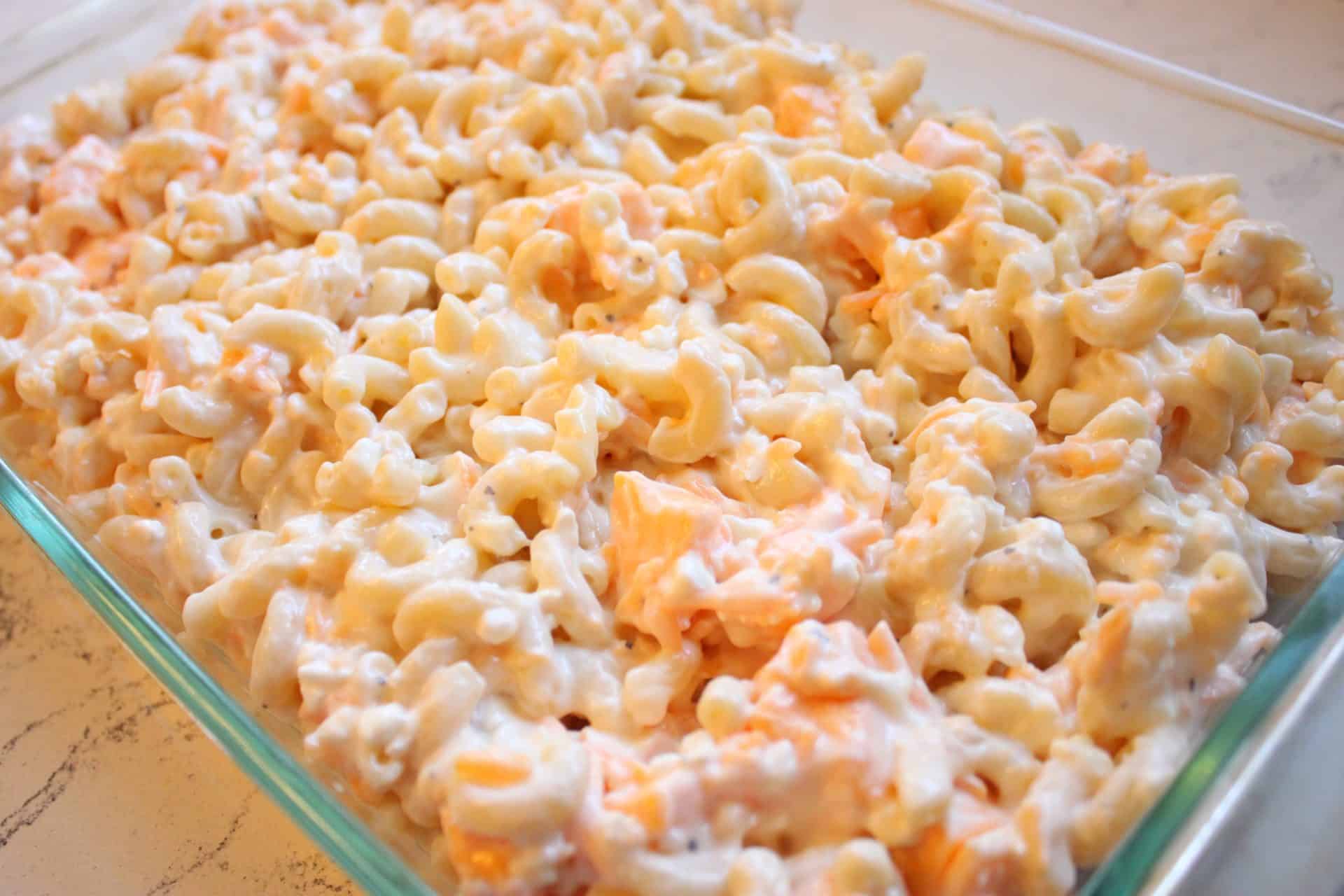 Mixed Macaroni Ingredients Added to Glass Casserole Dish