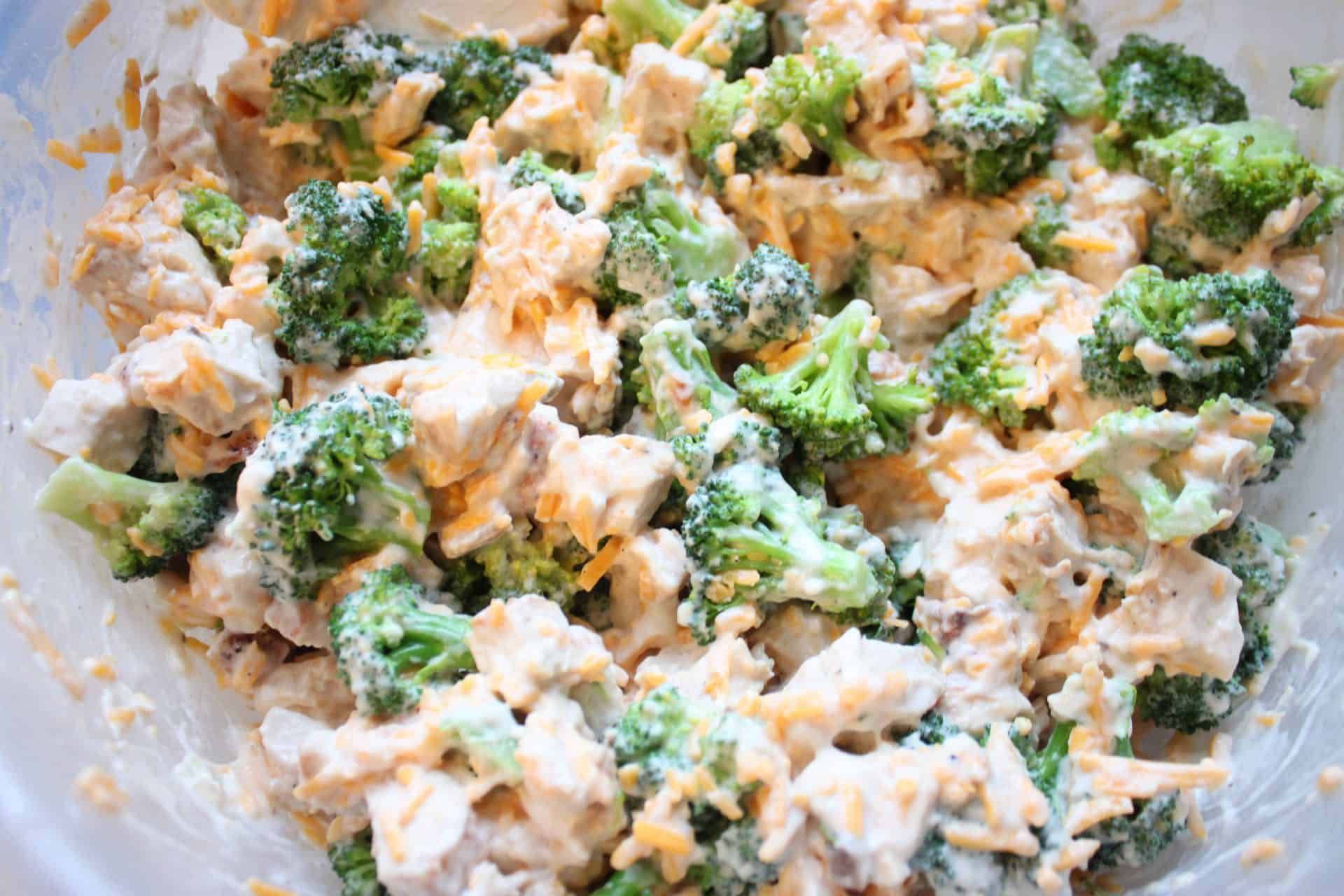 Delicious 30-Minute Chicken and Broccoli Casserole for Busy Nights 4 Chicken chunks and broccoli florets mixed into a creamy sauce before baking the 30 minute chicken and broccoli casserole.