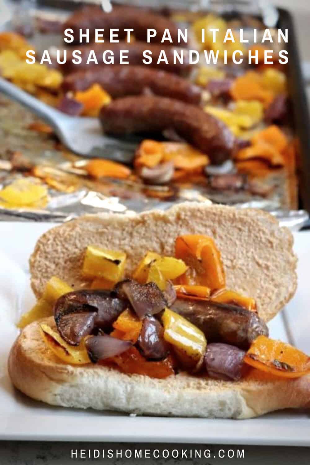 Sheet pan Italian sausage hoagie sandwiches with sausage and roasted veggies on foil, perfect for a fast 30-minute weeknight meal.