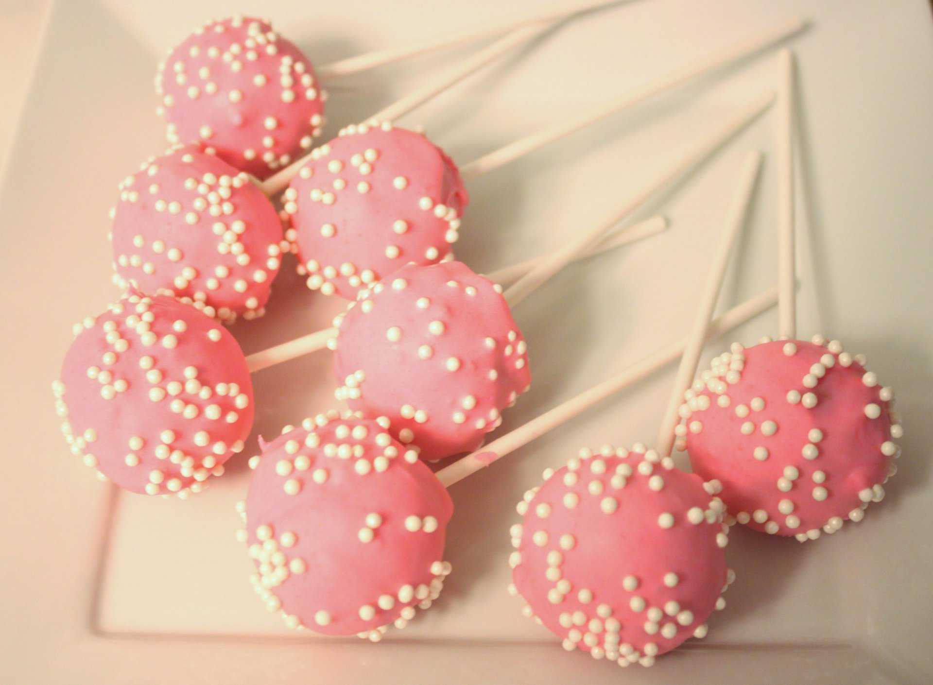 Plate of Pink Dipped Vanilla Cream Cheese Cake Pops