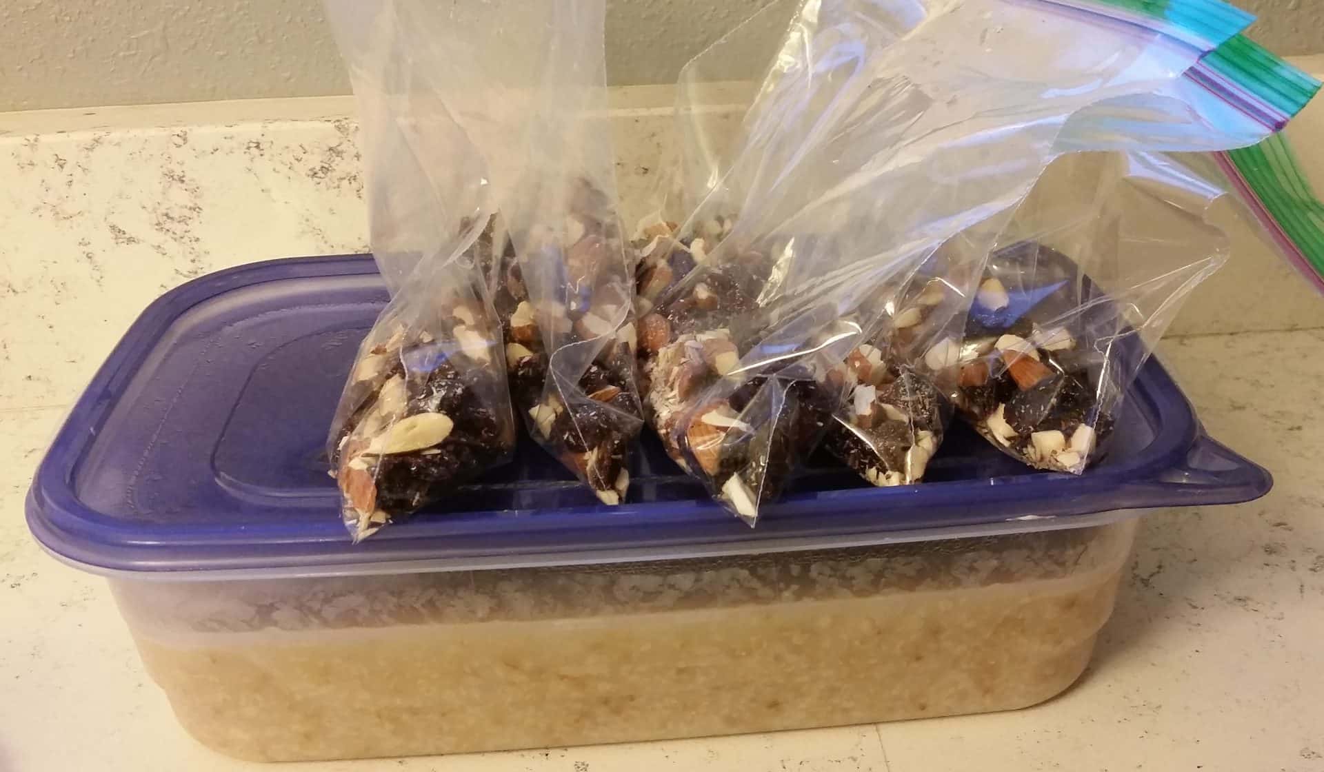 Pre-Made Steel Cut Oatmeal in a Tupperwear Container with Pre-Packed Almonds, Raisins, and Cranberries