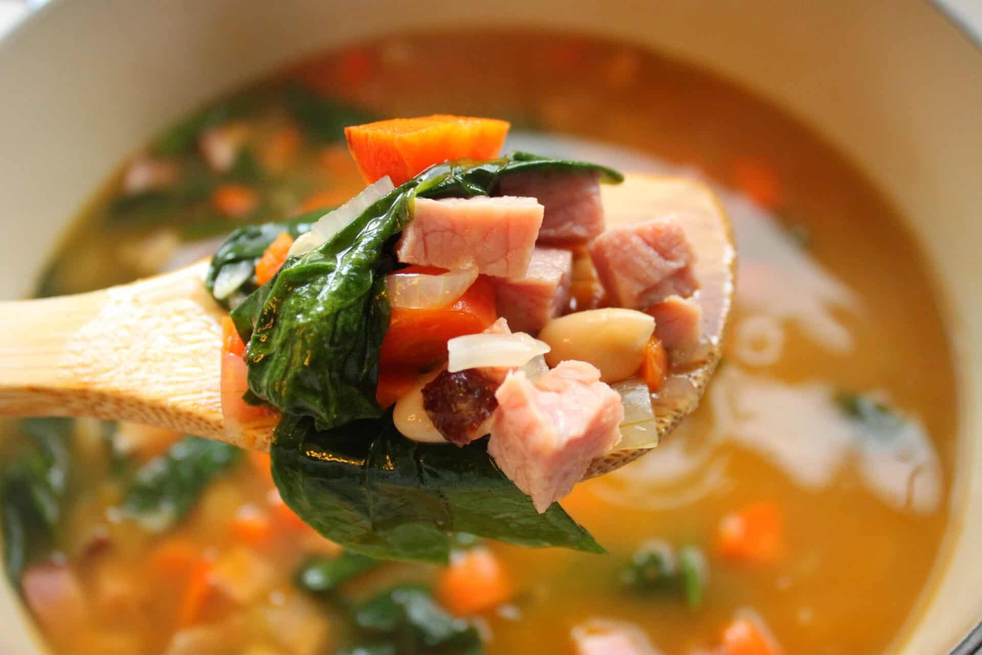 Revamp Easter Leftovers with Ham Spinach Cannellini Bean Soup 3 Remove Bay Leaves from Soup with a Large Wooden Stove