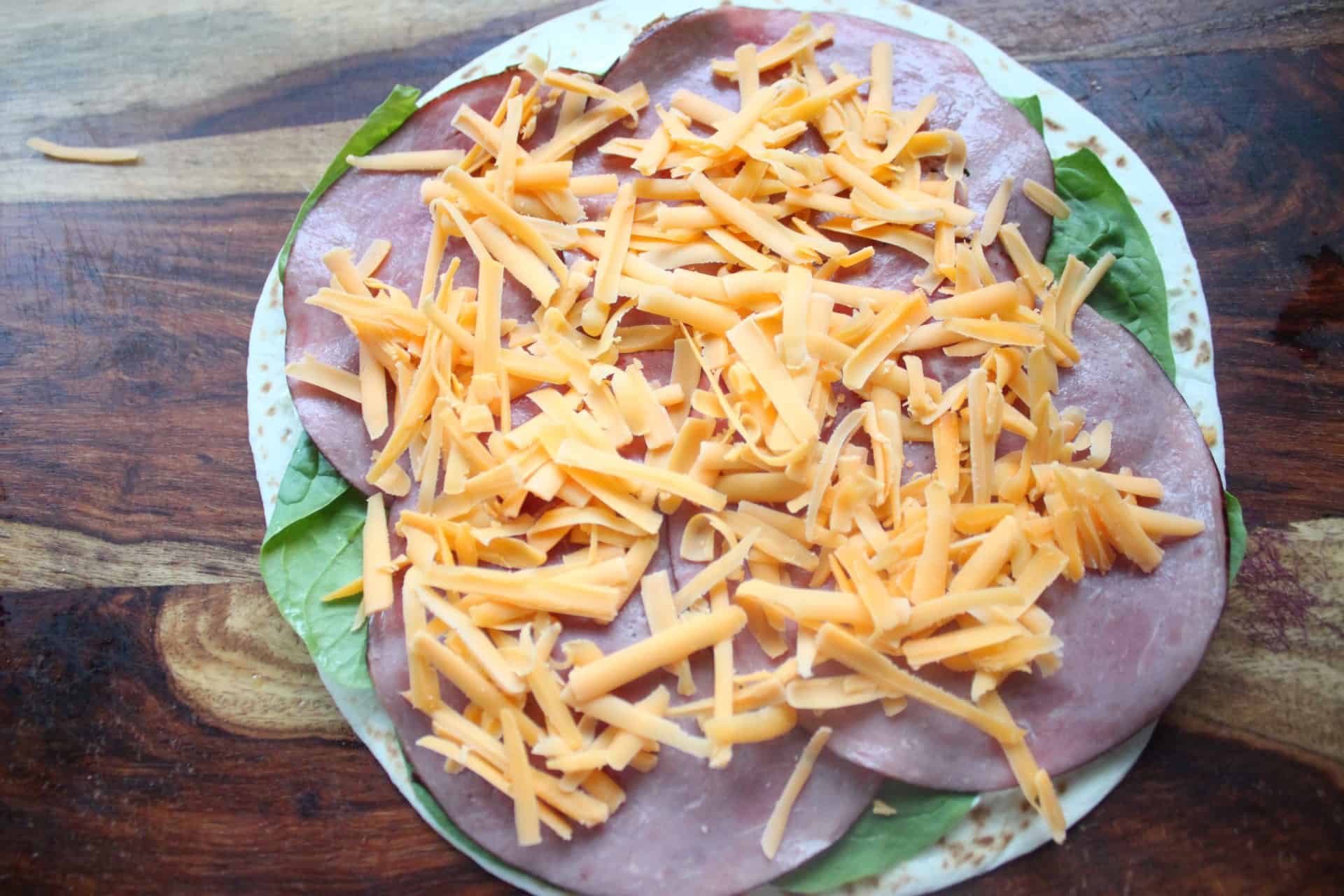 7-Minute Roast Beef Tortilla Wraps for Effortless Meals & Parties 5 Roast Beef and Cheddar Cheese Spread on Tortilla Wrap