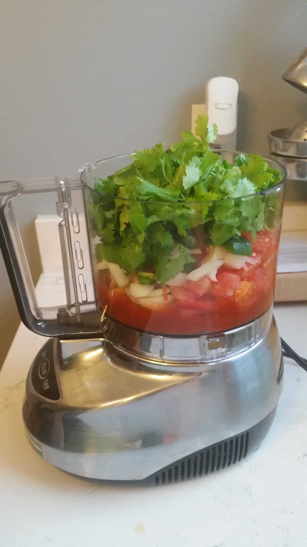 Food Processor blending the Cilantro Lime Salsa