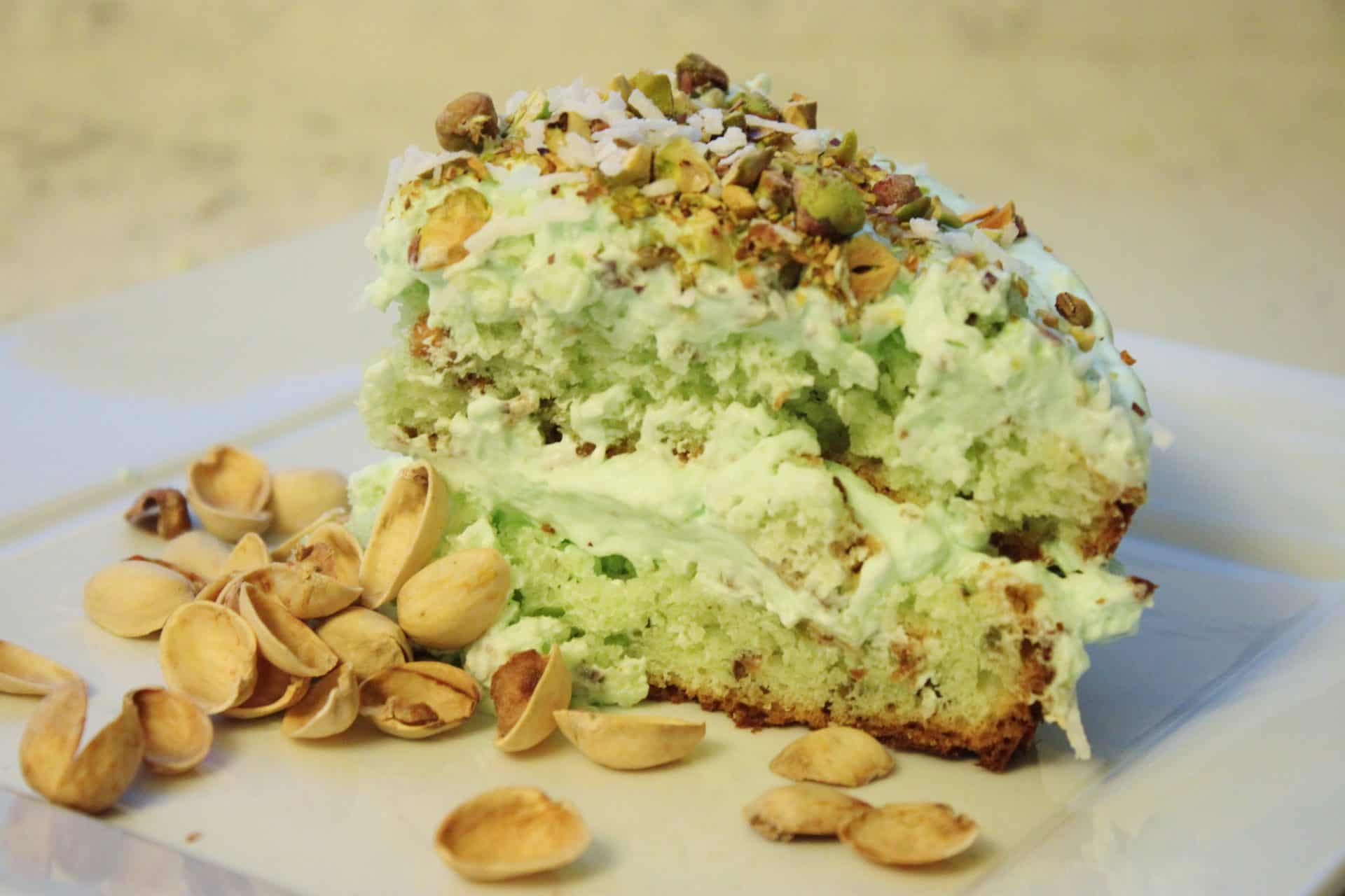 Slice of Pistachio and Coconut Pudding Cake