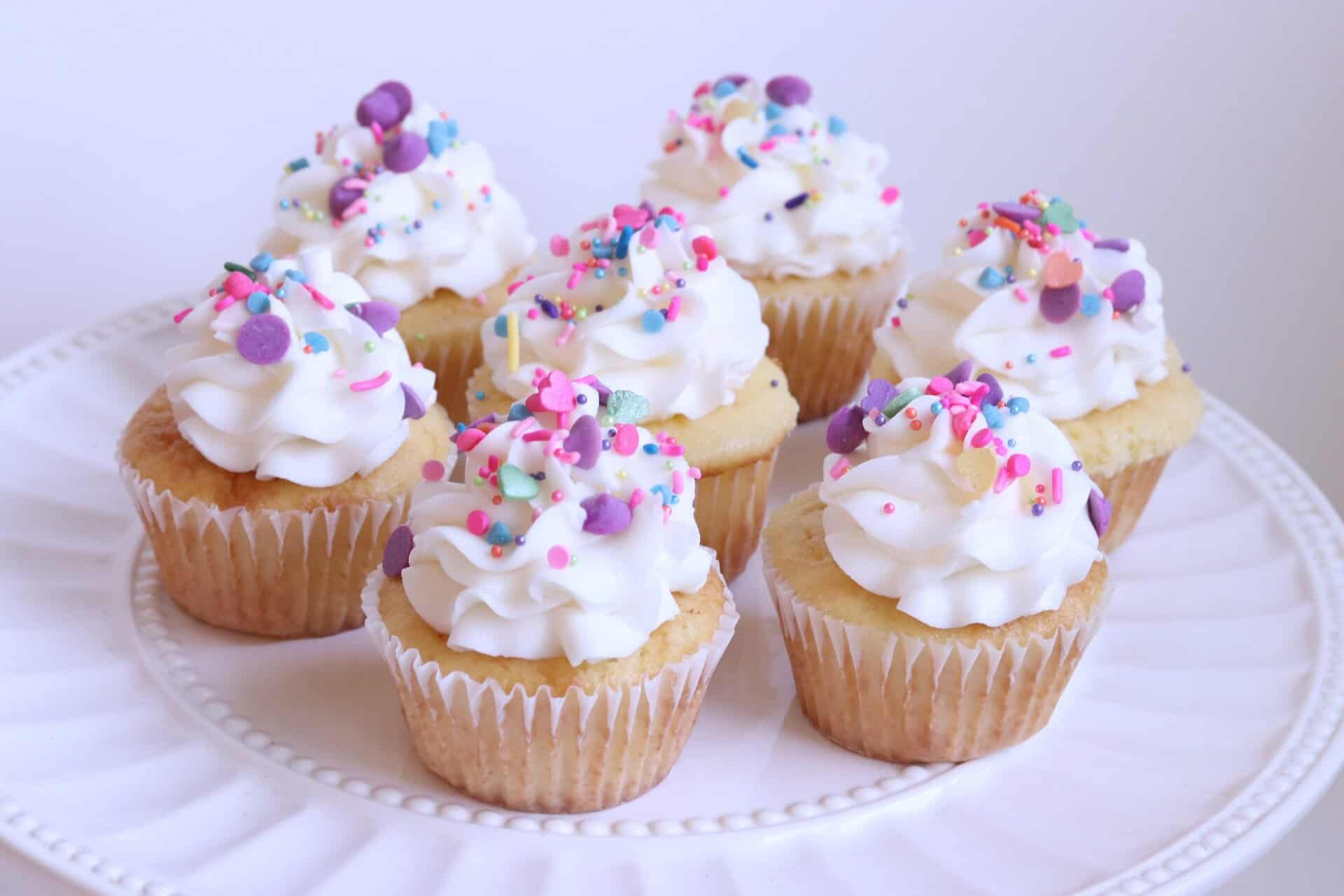 Vanilla Cupcakes with 5-Ingredient Buttercream Frosting Sitting on a Ceramic Display