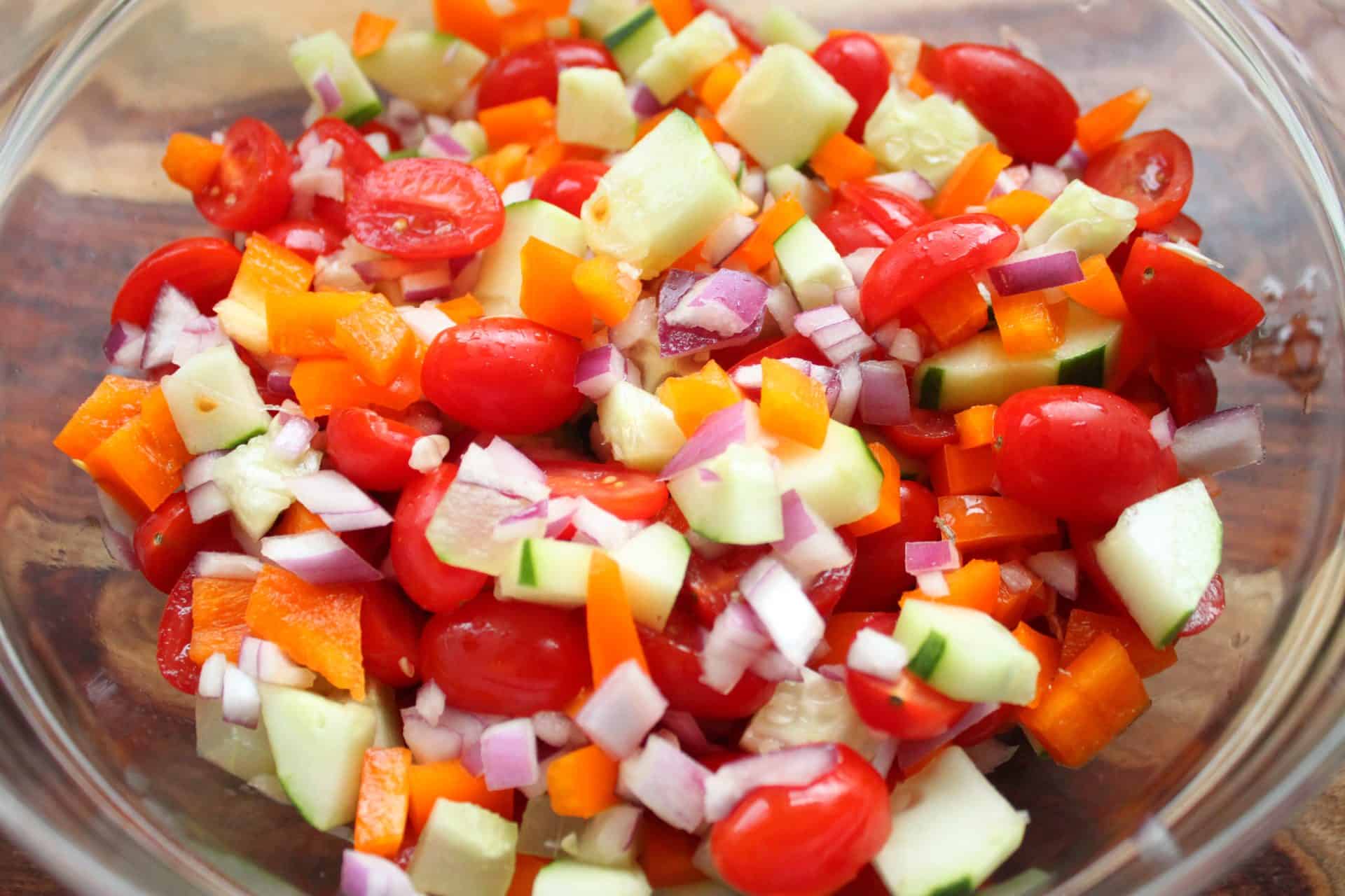 Vegetables for Greek Pasta Salad in a Glass Bowl