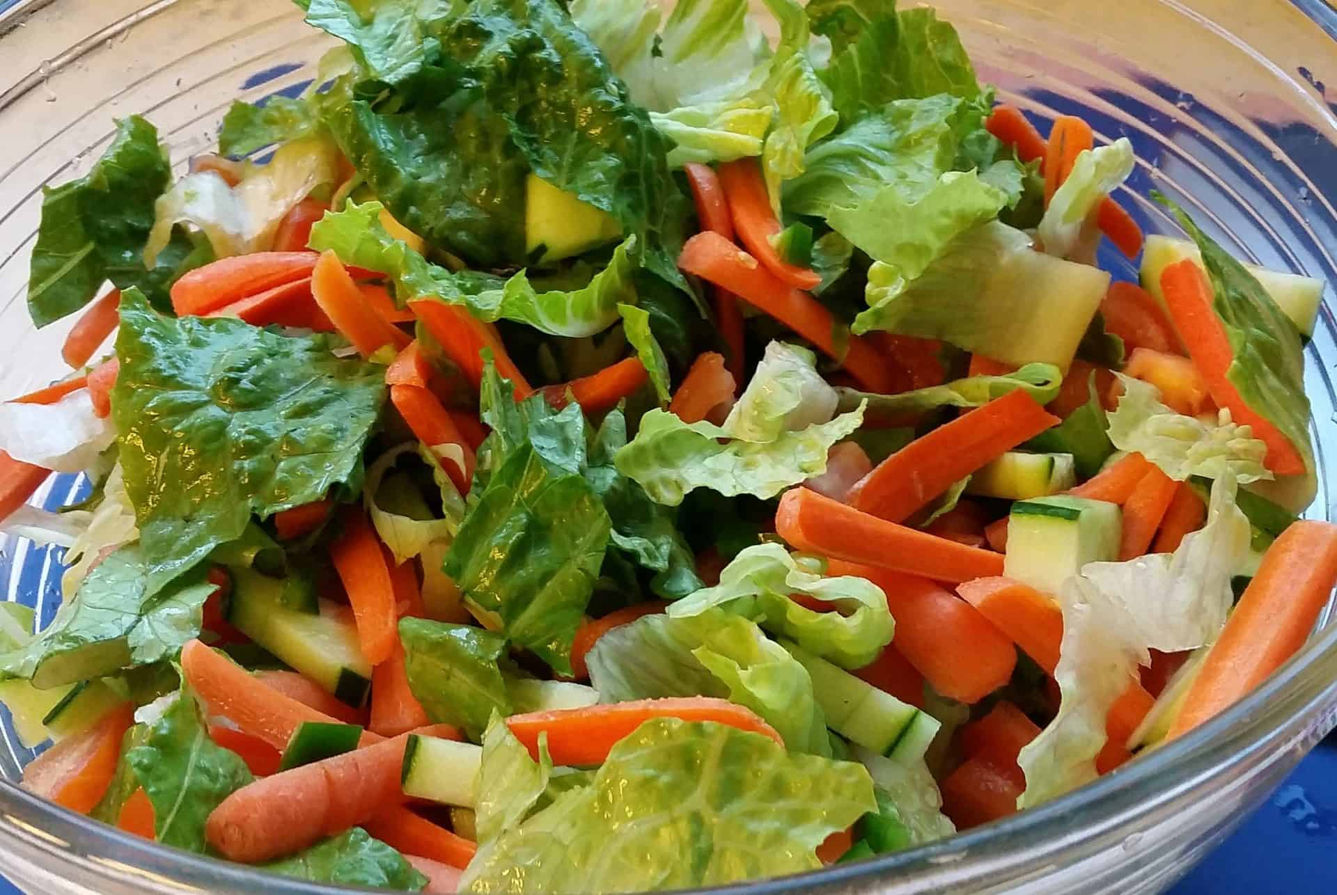 Veggies for Caesar Salad in a Glass Bowl