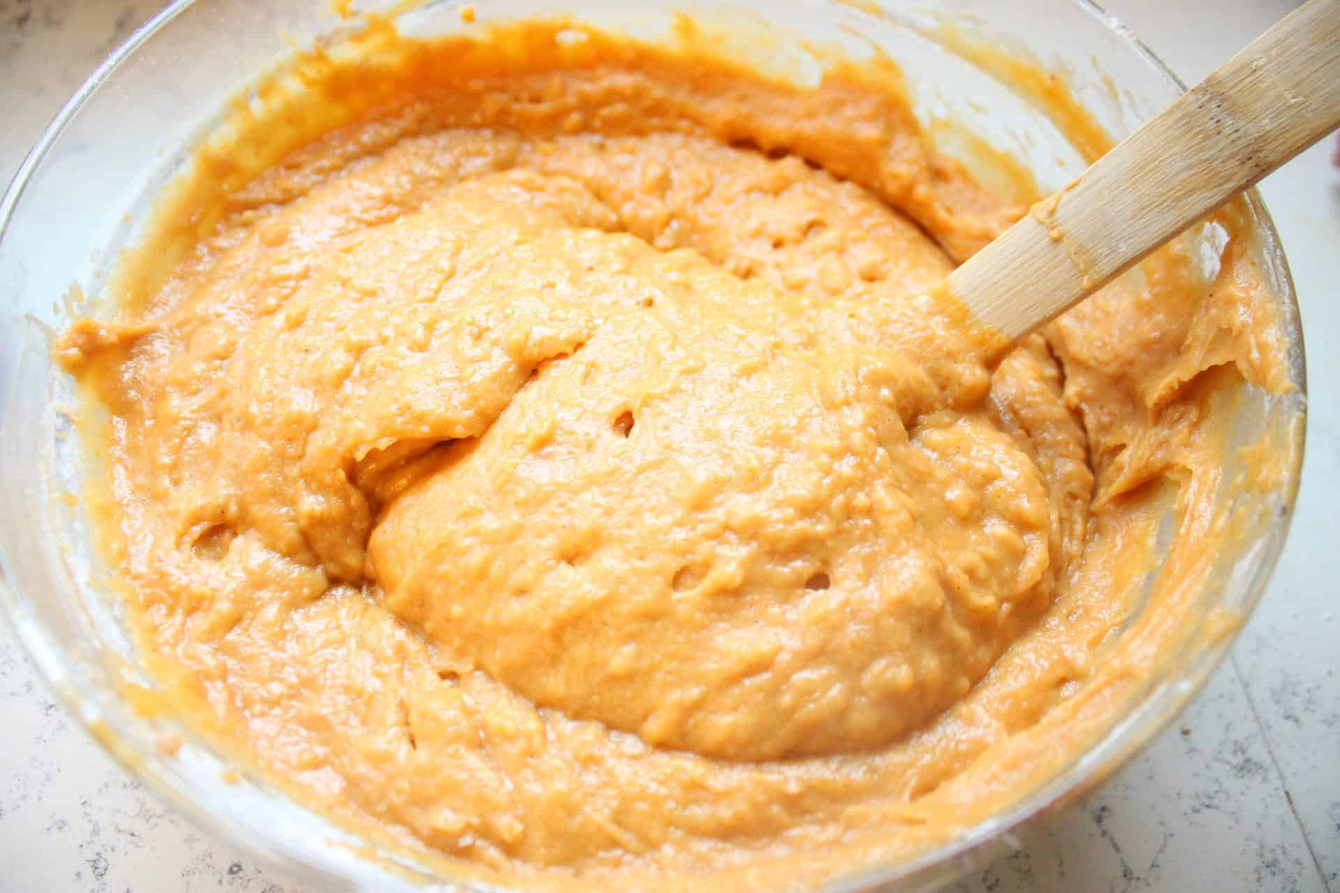 Wet and Dry Ingredients Mixed Together for Pumkin Muffins and Vanilla Frosting