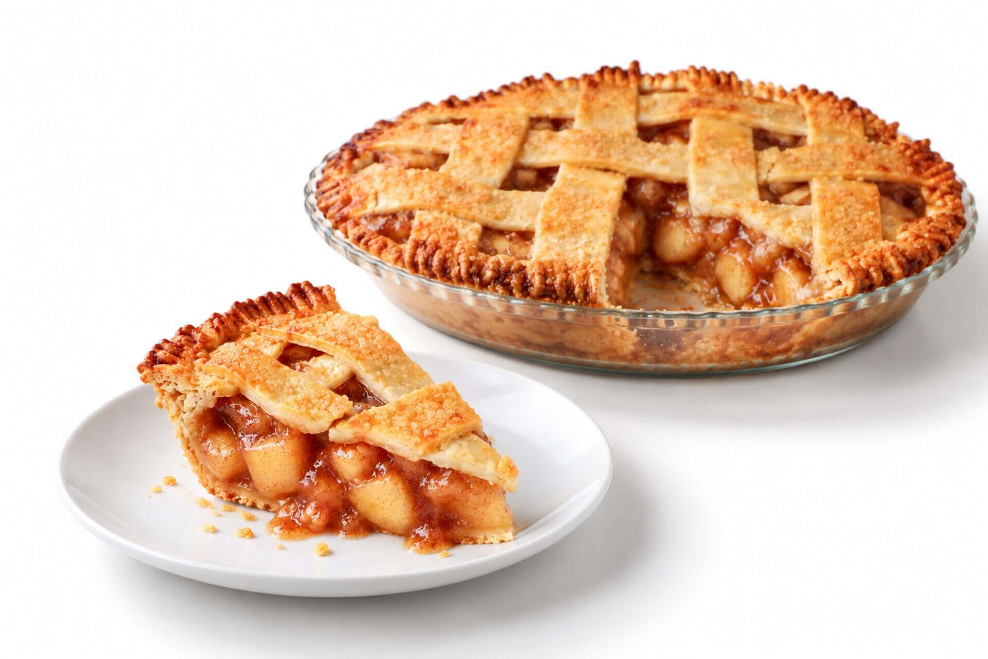 Apple pie slice on a plate with the whole pie, one slice missing, visible behind it.