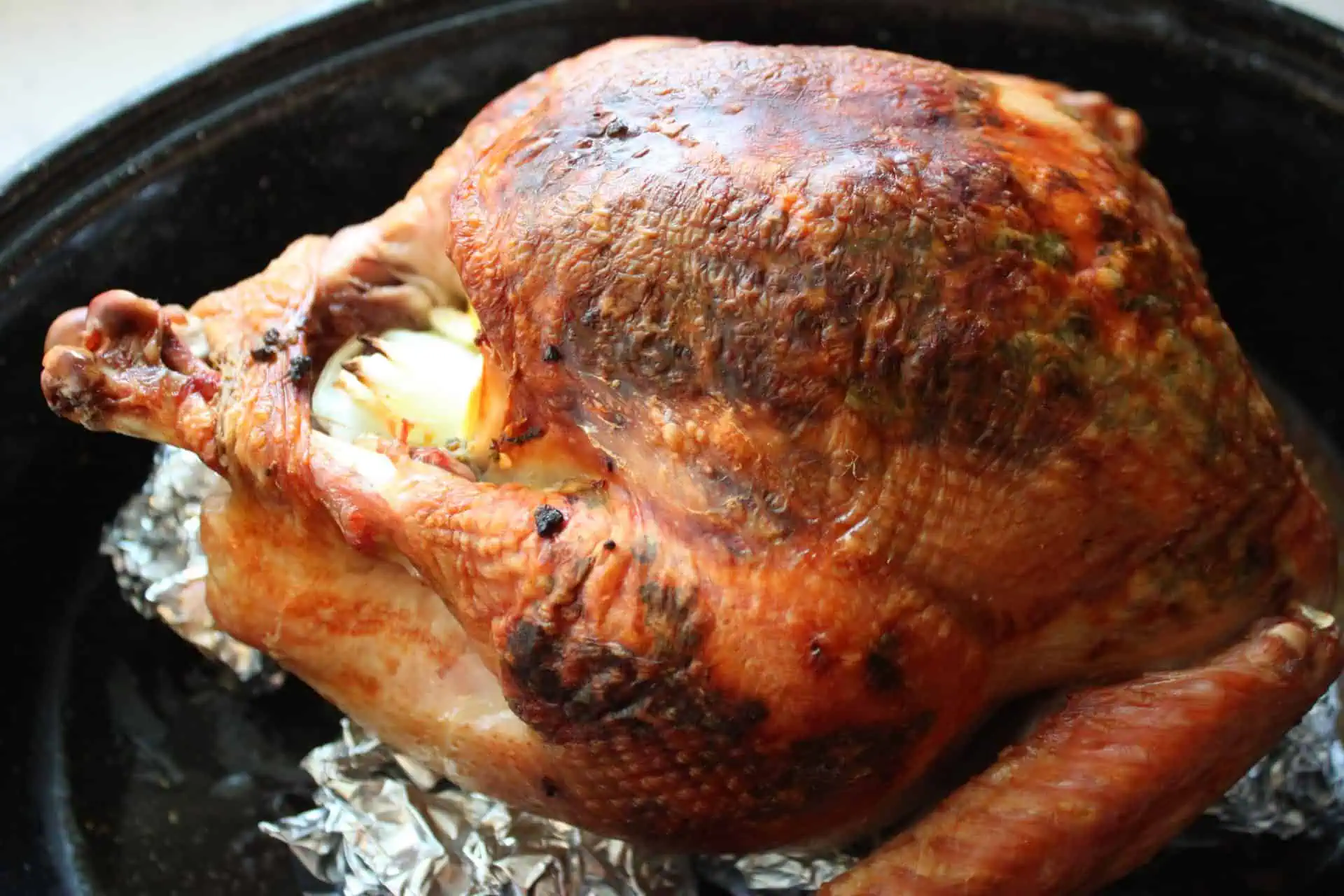 Foolproof 3-Step Tuscan-Style Roasted Turkey for the Holidays 14 Tuscan-style roasted turkey after 1.5 hours in the oven, golden brown and ready for the first basting session.
